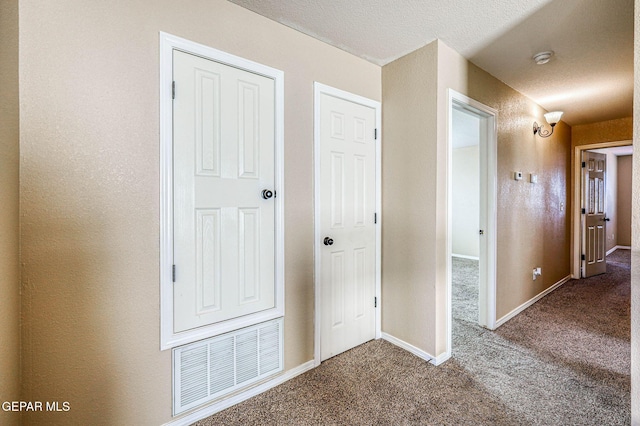 14376 N Cave Dr, El Paso, TX 79938 - hall with dark carpet and baseboards