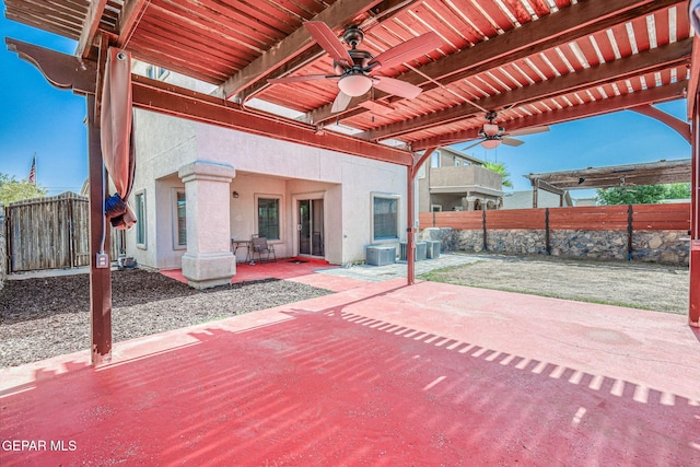 14376 N Cave Dr, El Paso, TX 79938 - fenced backyard with a ceiling fan, a patio, and a pergola