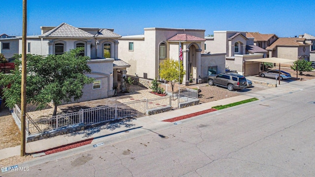 14376 N Cave Dr, El Paso, TX 79938 - view of front facade with stucco siding, a tile roof, and a residential view
