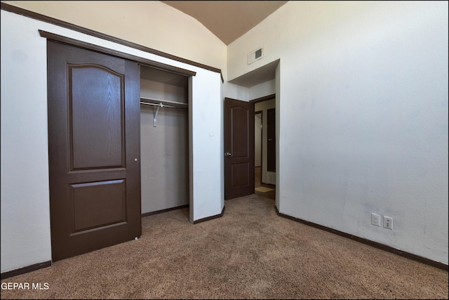 4908 Gold Ranch Ave, El Paso, TX 79934 - unfurnished bedroom with carpet, vaulted ceiling, and a closet
