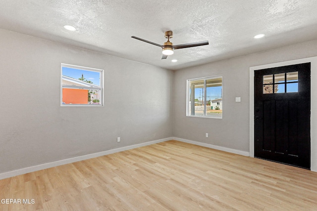 5112 Sun Valley Dr, El Paso, TX 79924 - entryway featuring light wood-style floors, a ceiling fan, a textured ceiling, and recessed lighting