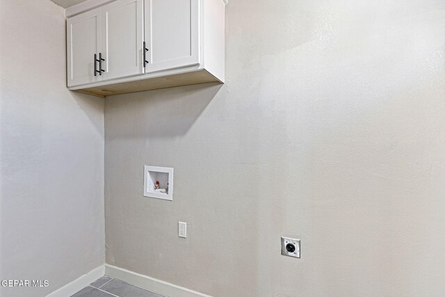 5112 Sun Valley Dr, El Paso, TX 79924 - laundry area featuring cabinet space, hookup for an electric dryer, hookup for a washing machine, and tile patterned flooring