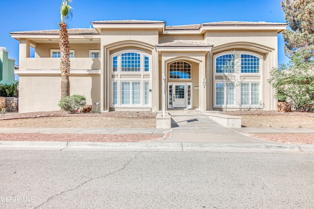 6570 Eagle Ridge Dr, El Paso, TX 79912 - view of front of house featuring stucco siding and a tile roof