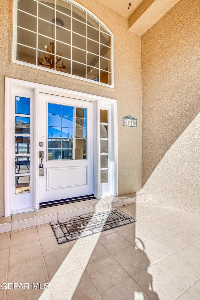 6570 Eagle Ridge Dr, El Paso, TX 79912 - doorway to property with stucco siding