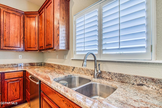 6570 Eagle Ridge Dr, El Paso, TX 79912 - kitchen featuring stainless steel dishwasher and light stone counters