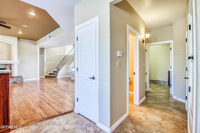 6570 Eagle Ridge Dr, El Paso, TX 79912 - hall with stairs and recessed lighting