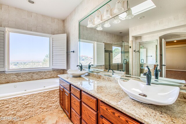 6570 Eagle Ridge Dr, El Paso, TX 79912 - full bath with a shower stall, a whirlpool tub, and double vanity