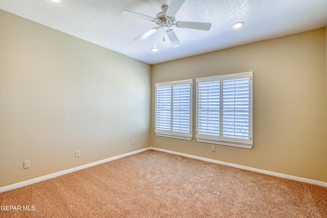 6570 Eagle Ridge Dr, El Paso, TX 79912 - unfurnished room with carpet floors, a ceiling fan, and recessed lighting
