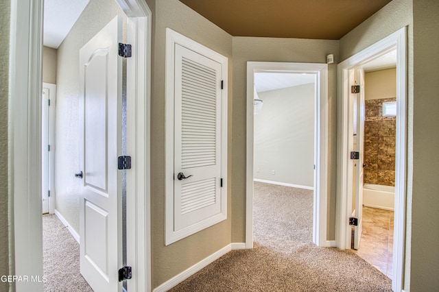6570 Eagle Ridge Dr, El Paso, TX 79912 - hallway with carpet floors and a textured wall