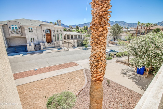 6570 Eagle Ridge Dr, El Paso, TX 79912 - fenced front yard featuring a mountain view