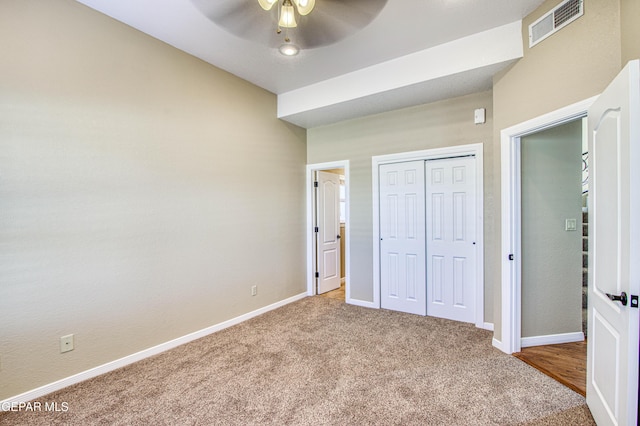 6570 Eagle Ridge Dr, El Paso, TX 79912 - unfurnished bedroom with carpet flooring, a closet, and a ceiling fan