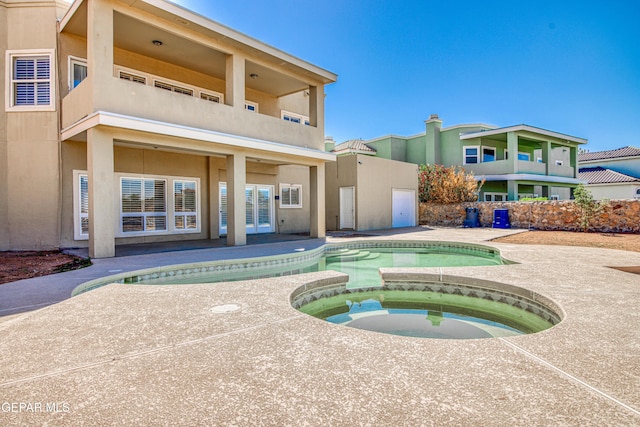 6570 Eagle Ridge Dr, El Paso, TX 79912 - view of swimming pool featuring a patio and a pool with connected hot tub