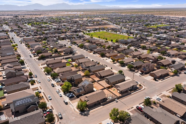 14477 Jacinto Ramos Ave, El Paso, TX 79938 - aerial view of property's location featuring a mountain backdrop and nearby suburban area