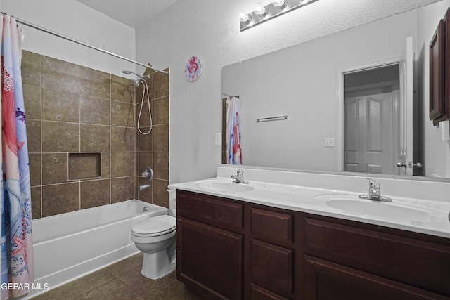 14477 Jacinto Ramos Ave, El Paso, TX 79938 - full bathroom featuring double vanity, shower / tub combo with curtain, and tile patterned floors