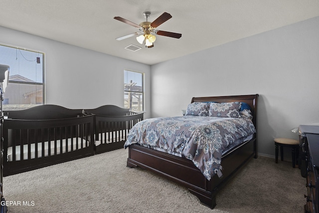14477 Jacinto Ramos Ave, El Paso, TX 79938 - carpeted bedroom featuring a ceiling fan and baseboards