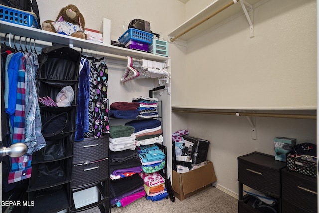 14477 Jacinto Ramos Ave, El Paso, TX 79938 - walk in closet featuring carpet flooring