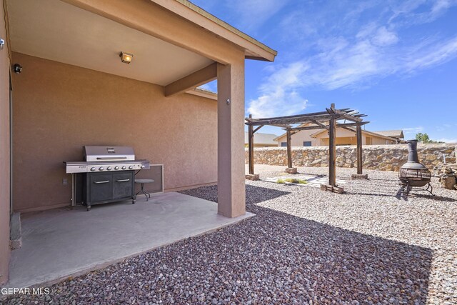 14477 Jacinto Ramos Ave, El Paso, TX 79938 - view of patio featuring a pergola and area for grilling
