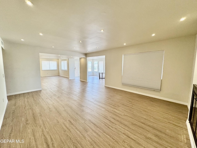 536 Satellite Dr, El Paso, TX 79912 - spare room with recessed lighting and light wood-style flooring