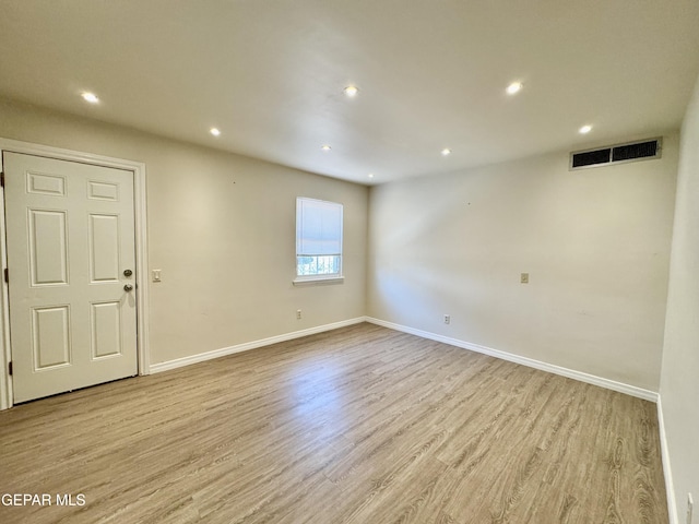536 Satellite Dr, El Paso, TX 79912 - spare room featuring light wood finished floors and recessed lighting