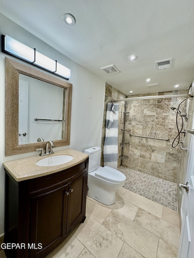536 Satellite Dr, El Paso, TX 79912 - bathroom with vanity, a shower stall, and recessed lighting
