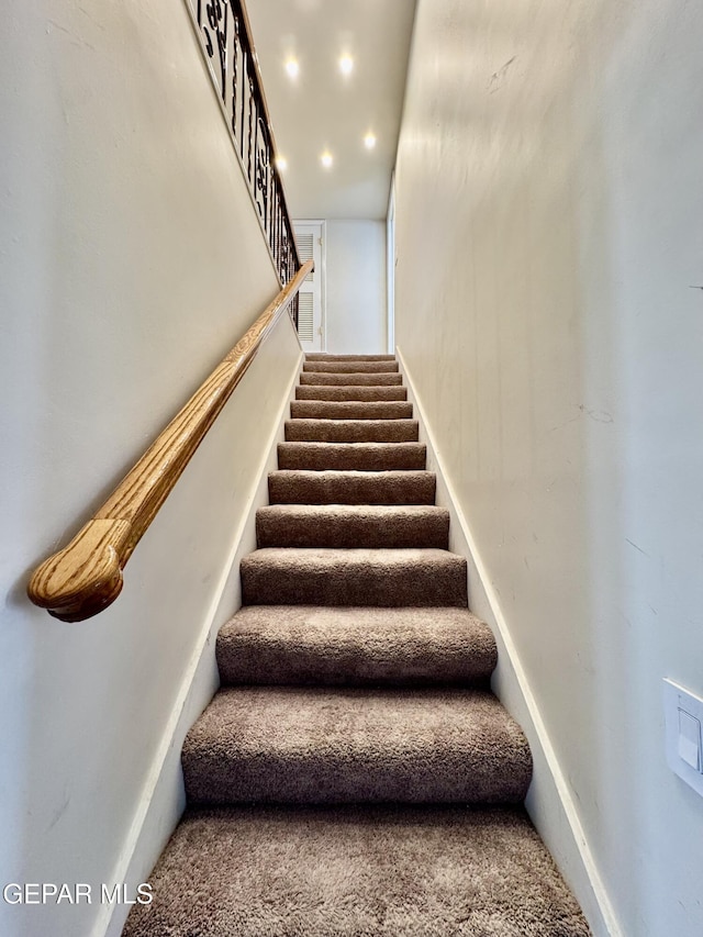 536 Satellite Dr, El Paso, TX 79912 - staircase featuring carpet floors and recessed lighting