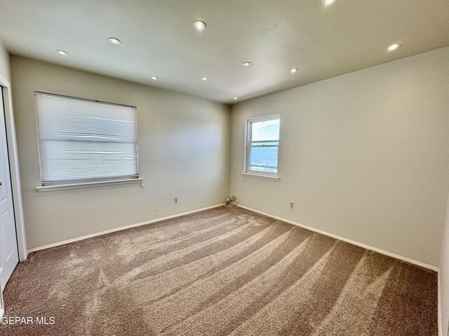 536 Satellite Dr, El Paso, TX 79912 - carpeted spare room featuring recessed lighting and baseboards