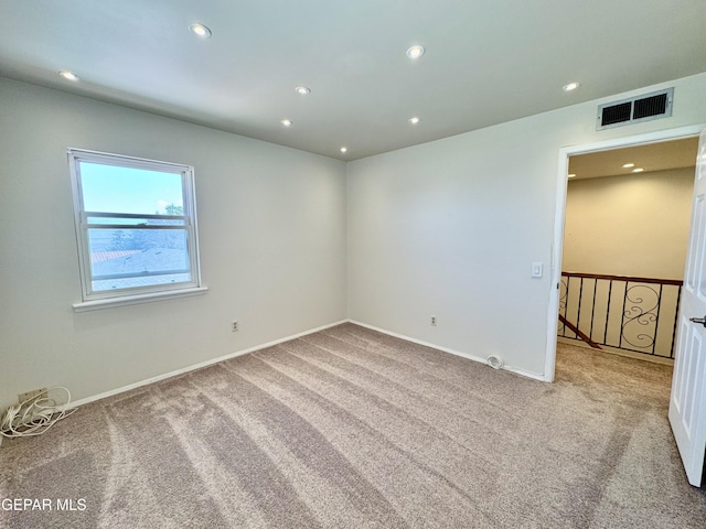 536 Satellite Dr, El Paso, TX 79912 - empty room with carpet floors and recessed lighting