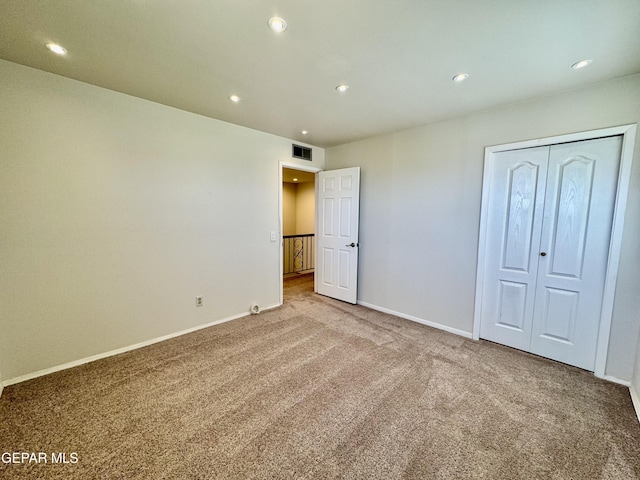 536 Satellite Dr, El Paso, TX 79912 - unfurnished bedroom featuring carpet floors, recessed lighting, and a closet