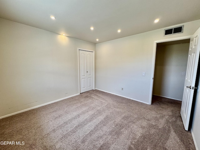 536 Satellite Dr, El Paso, TX 79912 - empty room with carpet and recessed lighting