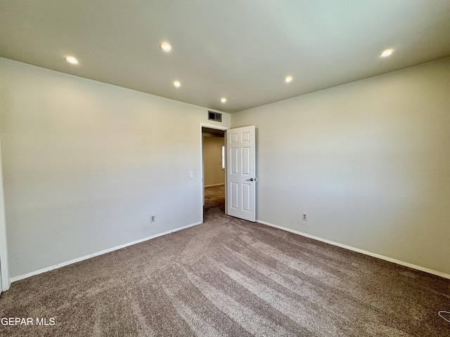 536 Satellite Dr, El Paso, TX 79912 - empty room featuring carpet floors and recessed lighting