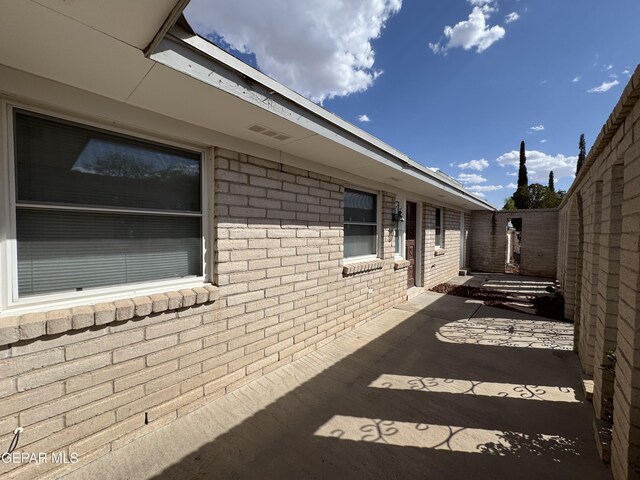 536 Satellite Dr, El Paso, TX 79912 - view of property exterior featuring brick siding