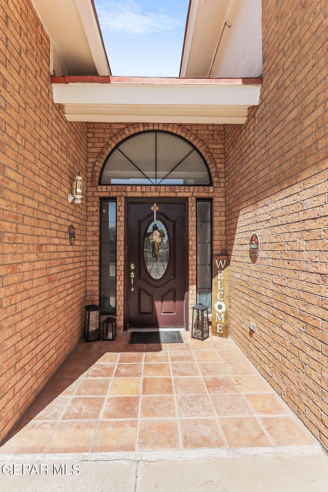 9769 Galilee Dr, El Paso, TX 79927 - view of exterior entry with brick siding