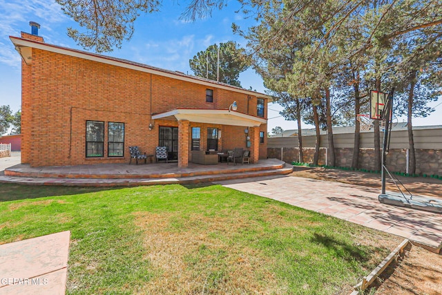9769 Galilee Dr, El Paso, TX 79927 - rear view of property featuring brick siding, a patio area, and a wooden deck