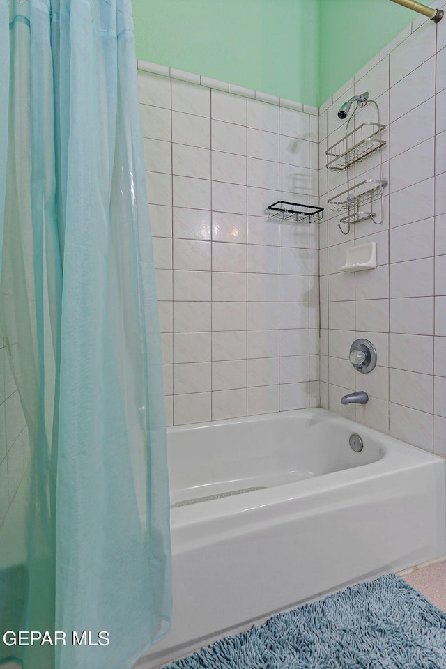 9769 Galilee Dr, El Paso, TX 79927 - full bathroom featuring shower / bath combo with shower curtain
