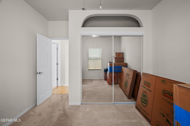 11202 Redstone Peak Place, El Paso, TX 79934 - carpeted bedroom featuring a closet and baseboards
