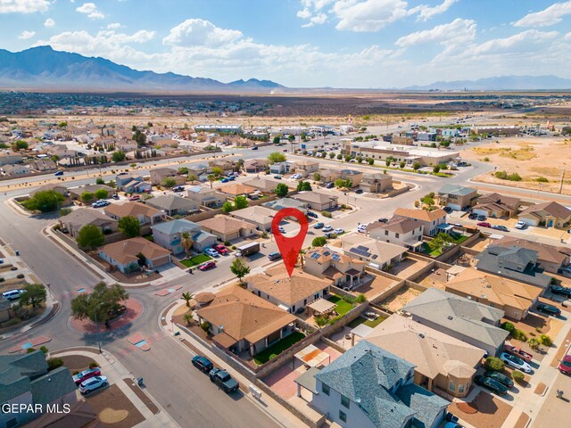 11202 Redstone Peak Place, El Paso, TX 79934 - aerial view of residential area featuring a mountainous background