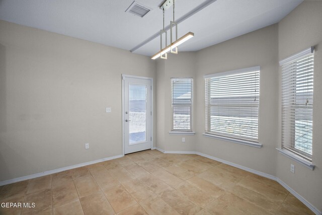 7722 Enchanted Ridge Dr, El Paso, TX 79911 - unfurnished room with plenty of natural light and light tile patterned floors