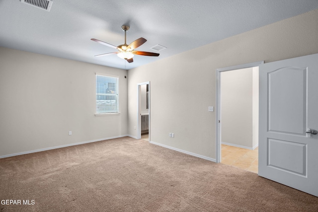 7722 Enchanted Ridge Dr, El Paso, TX 79911 - unfurnished bedroom featuring light colored carpet and ceiling fan