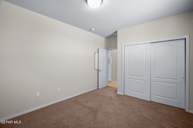 7722 Enchanted Ridge Dr, El Paso, TX 79911 - unfurnished bedroom featuring carpet flooring and a closet