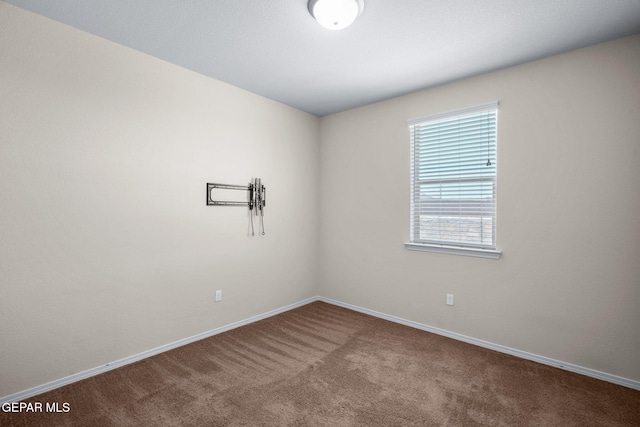7722 Enchanted Ridge Dr, El Paso, TX 79911 - carpeted empty room with baseboards