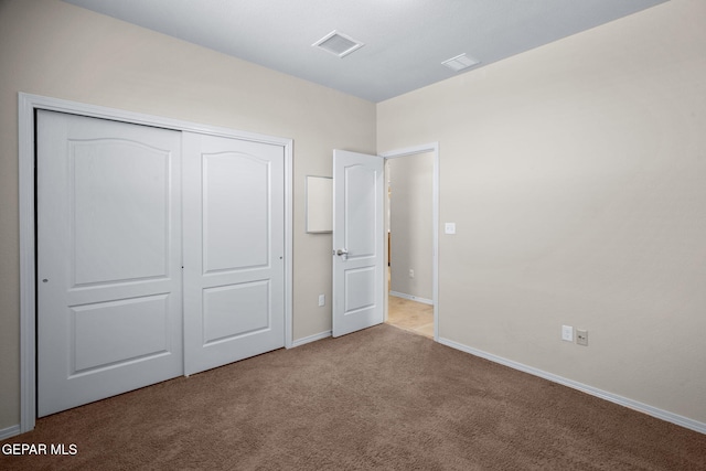 7722 Enchanted Ridge Dr, El Paso, TX 79911 - unfurnished bedroom featuring carpet flooring and a closet