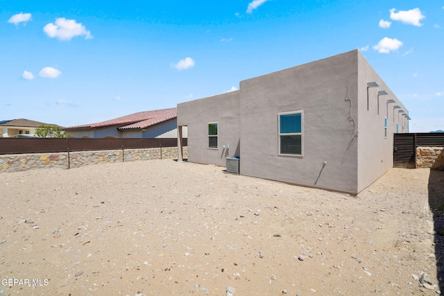 7722 Enchanted Ridge Dr, El Paso, TX 79911 - back of property with stucco siding and a fenced backyard