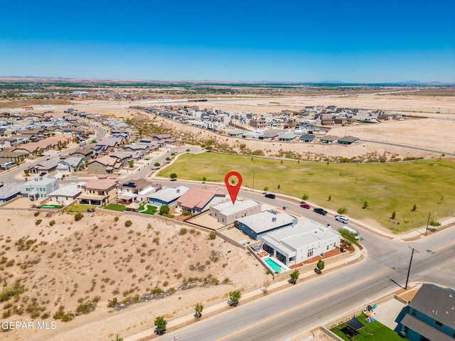 7722 Enchanted Ridge Dr, El Paso, TX 79911 - aerial overview of property's location with nearby suburban area