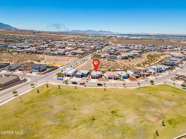 7722 Enchanted Ridge Dr, El Paso, TX 79911 - aerial view of property's location with a mountain backdrop and nearby suburban area