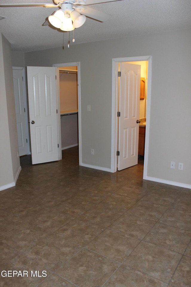 13978 Vaquero Rock Dr, El Paso, TX 79938 - spare room with a ceiling fan and a textured ceiling