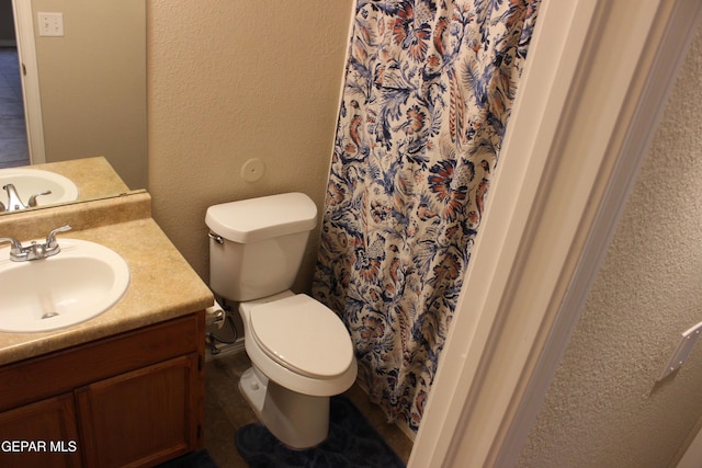 13978 Vaquero Rock Dr, El Paso, TX 79938 - full bathroom featuring vanity, a textured wall, and a shower with curtain