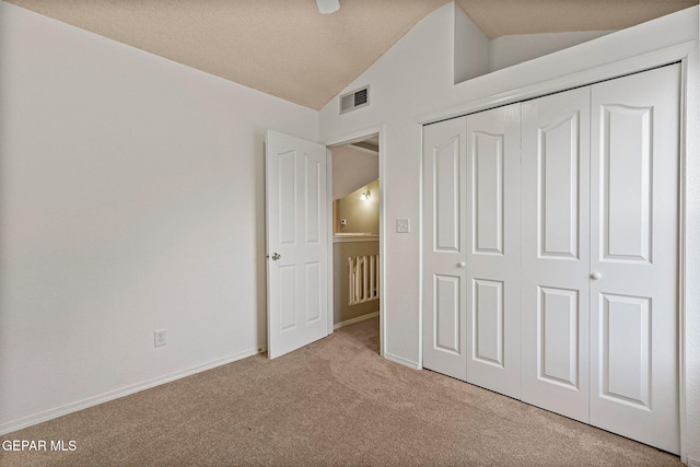 6736 Dakota Ridge Dr, El Paso, TX 79912 - unfurnished bedroom featuring vaulted ceiling, carpet floors, and a closet