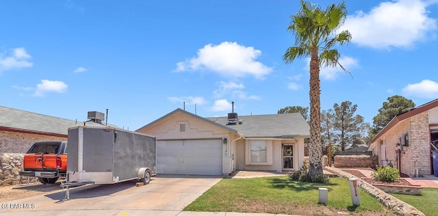 3280 Fawn Passage Place, El Paso, TX 79936 - view of front of property with a garage, driveway, a front yard, and stucco siding