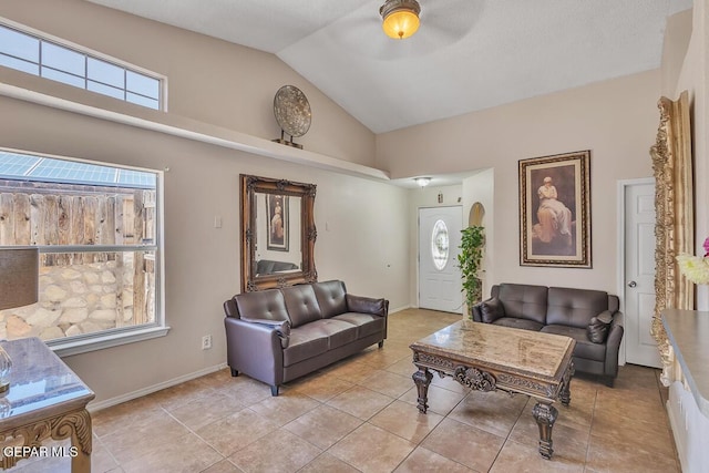 3280 Fawn Passage Place, El Paso, TX 79936 - living room featuring light tile patterned floors, a ceiling fan, and high vaulted ceiling
