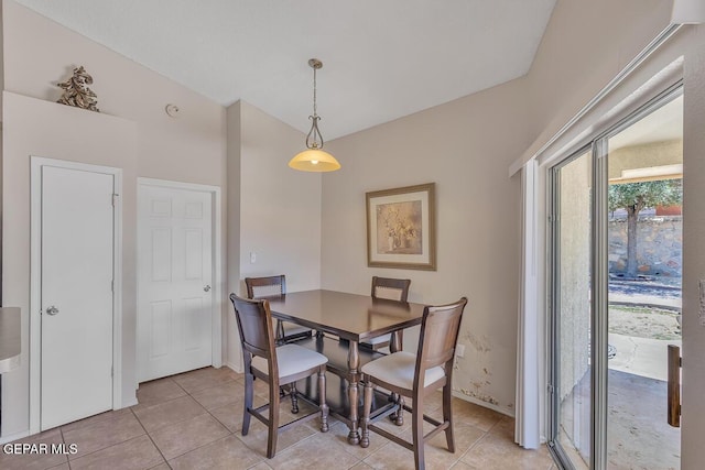 3280 Fawn Passage Place, El Paso, TX 79936 - dining room with light tile patterned floors and vaulted ceiling